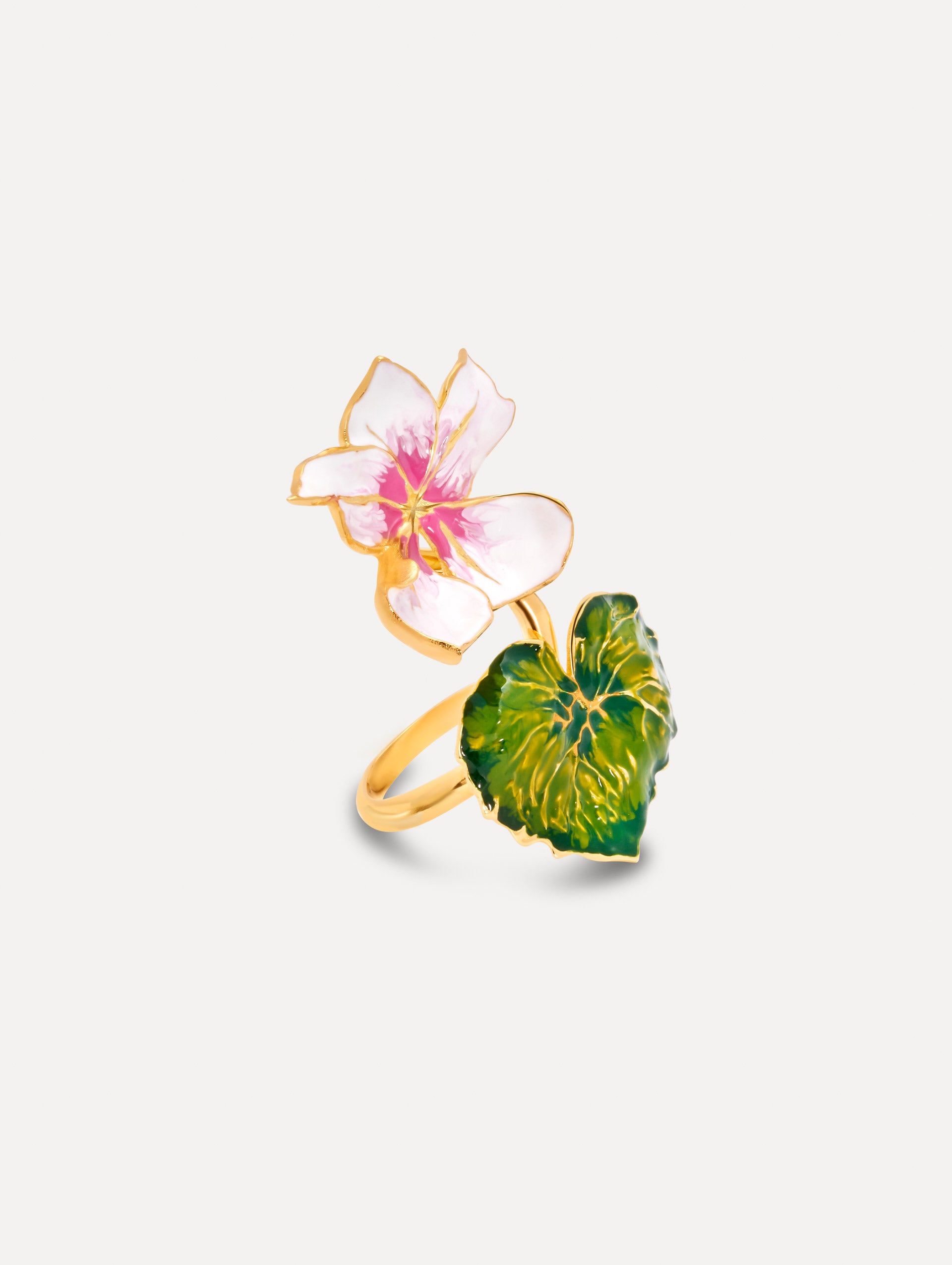 Gold Enamel Cyclamen Ring with a green leaf and a pink and white flower. Front View.