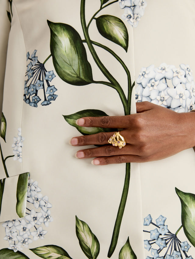 Gold Seashell Ring with circular embedded crystals. Front View.