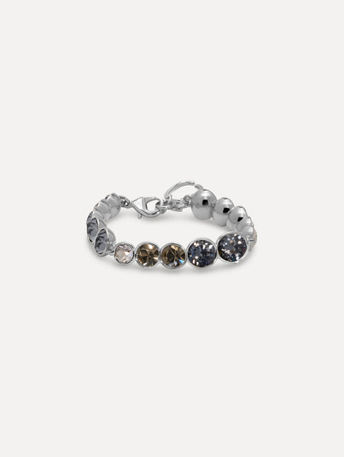 Gradient Rhinestone Strand Bracelet featuring a row of round, clear and smoky grey stones and an open circular clasp. Front View.