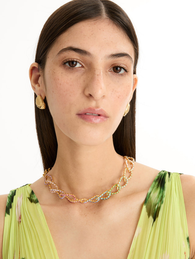 Rhinestone Chain-Link Necklace with interlocking oval links encrusted with multicolored pastel crystals. Front View.