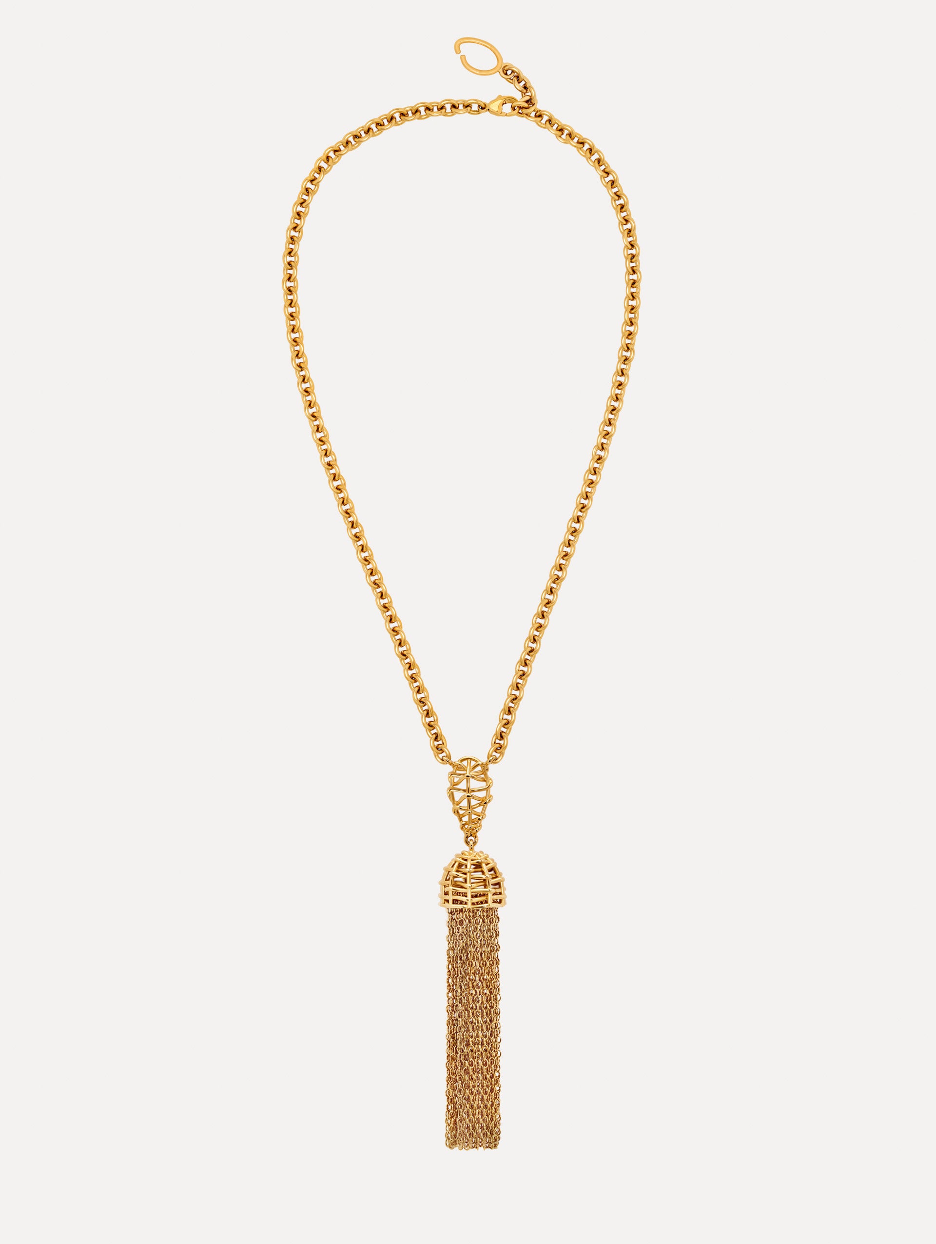 Gold Rattan Chancelier Pendant Necklace featuring an elongated pendant with an ornate cage detail and a long metallic tassel. Front View.