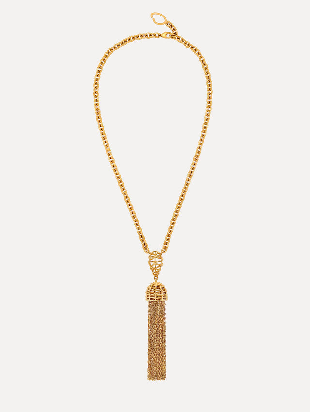 Gold Rattan Chancelier Pendant Necklace featuring an elongated pendant with an ornate cage detail and a long metallic tassel. Front View.