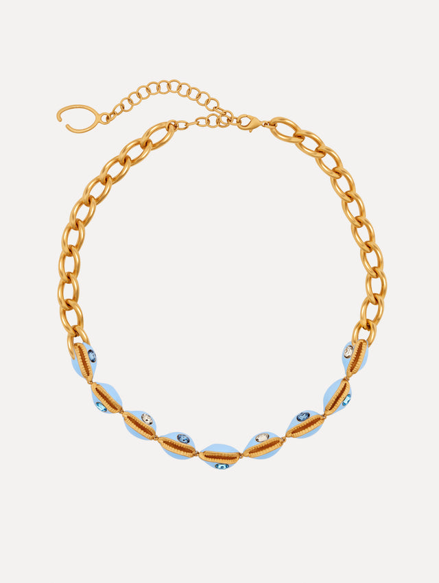 Blue Enamel Cowrie Shell Necklace with blue and gold enamel shells with blue and clear crystals. Front view.