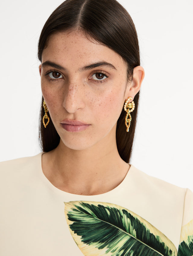 Gold Rhinestone Chain-Link Clip-On Earrings with green and clear crystals. Front View.