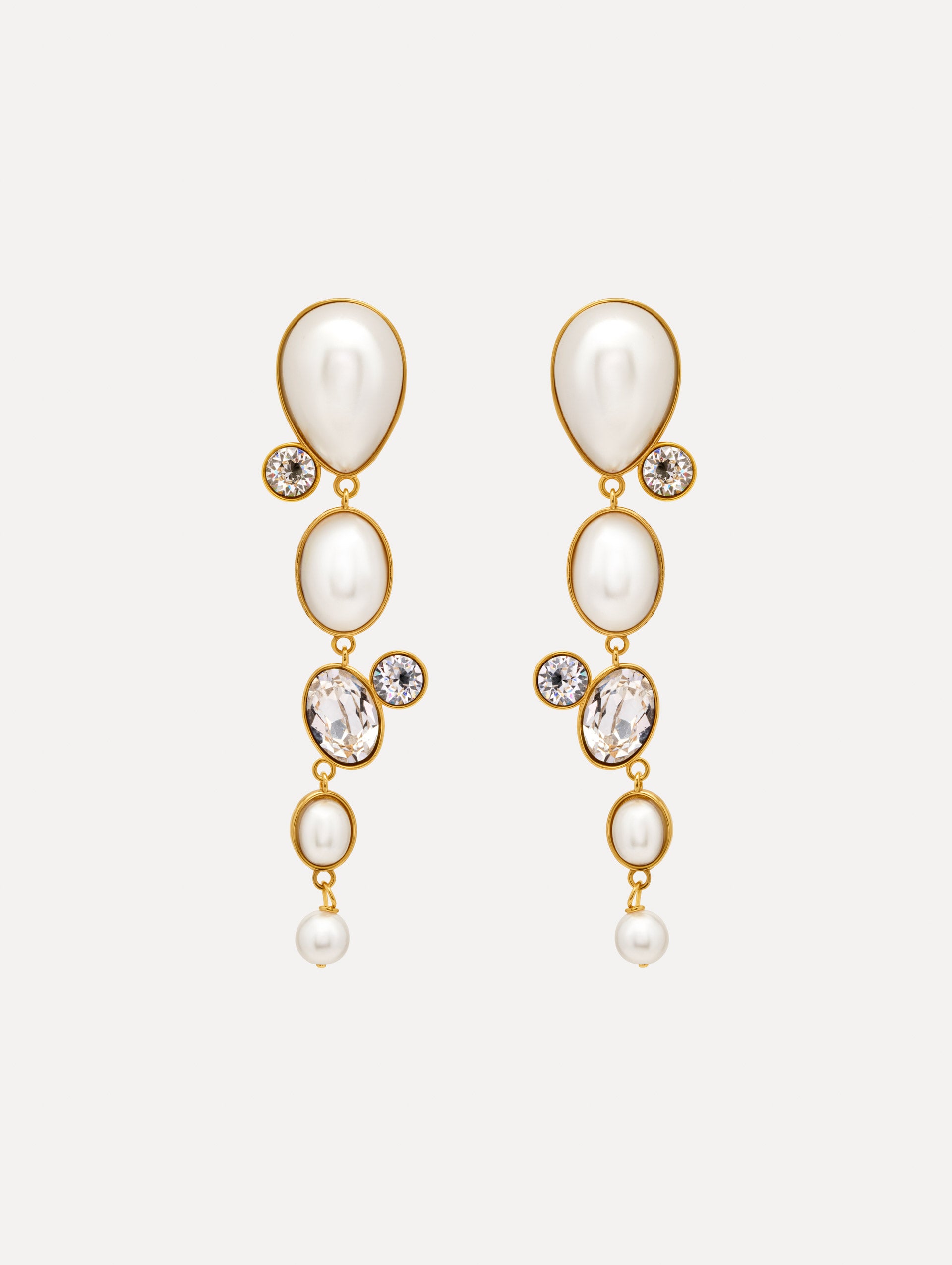 Pearls & Rhinestones Drop Clip-On Earrings with four pearls and three crystals cascading down. Front View.