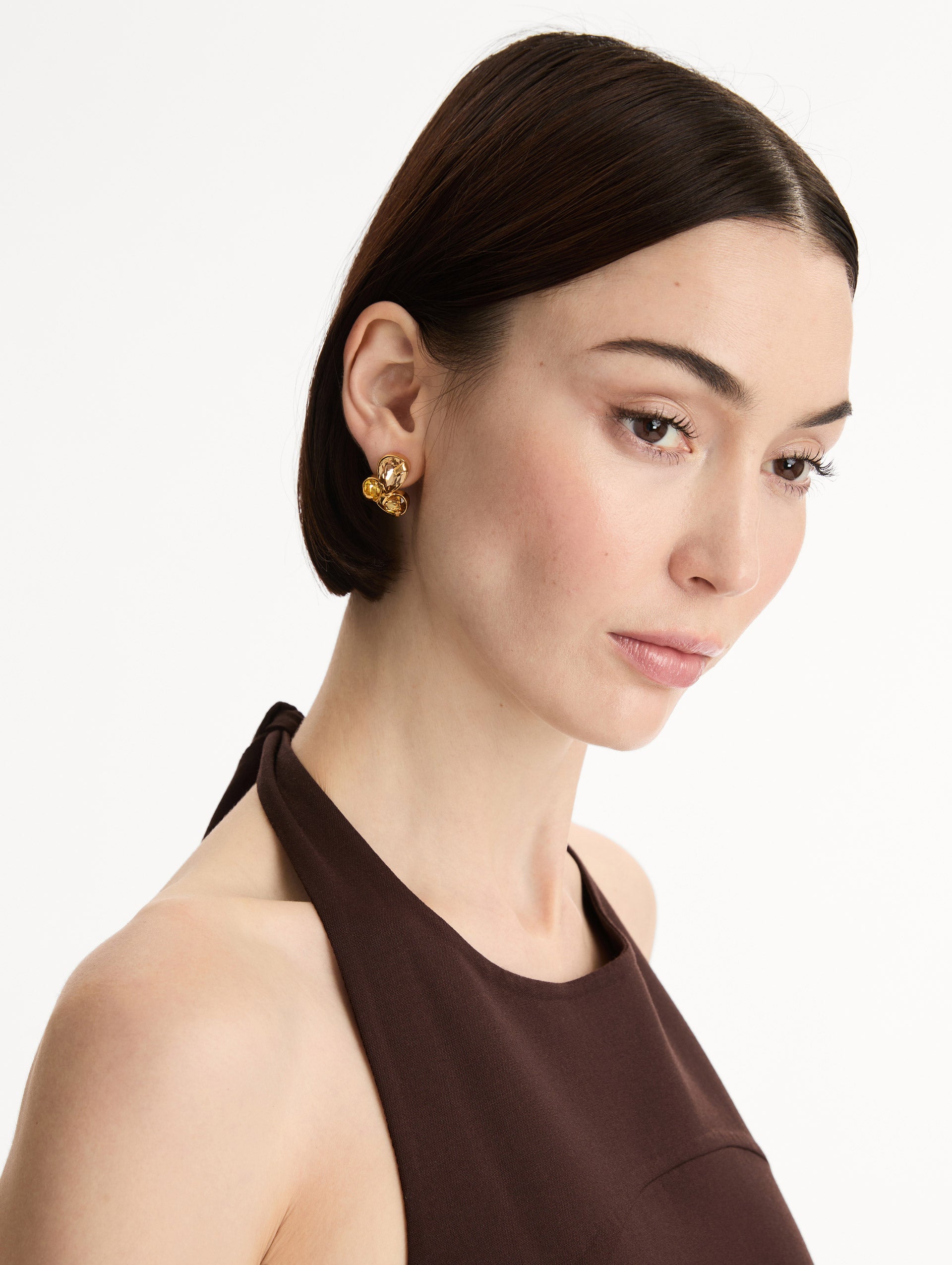 yellow Pear-Cut Cluster Earrings with three tier crystals and gold setting. Front View.