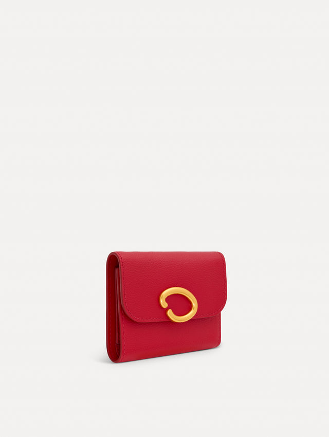 Red Tri-Fold Wallet featuring a gold O motif clasp. Side View.