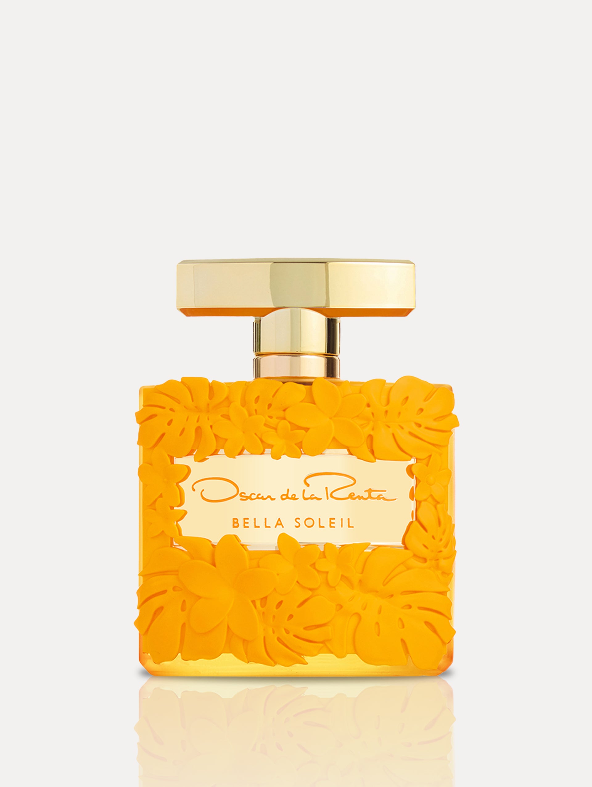 Bella Soleil Fragrance. Bottle is orange with floral motifs, gold spray. Front view.