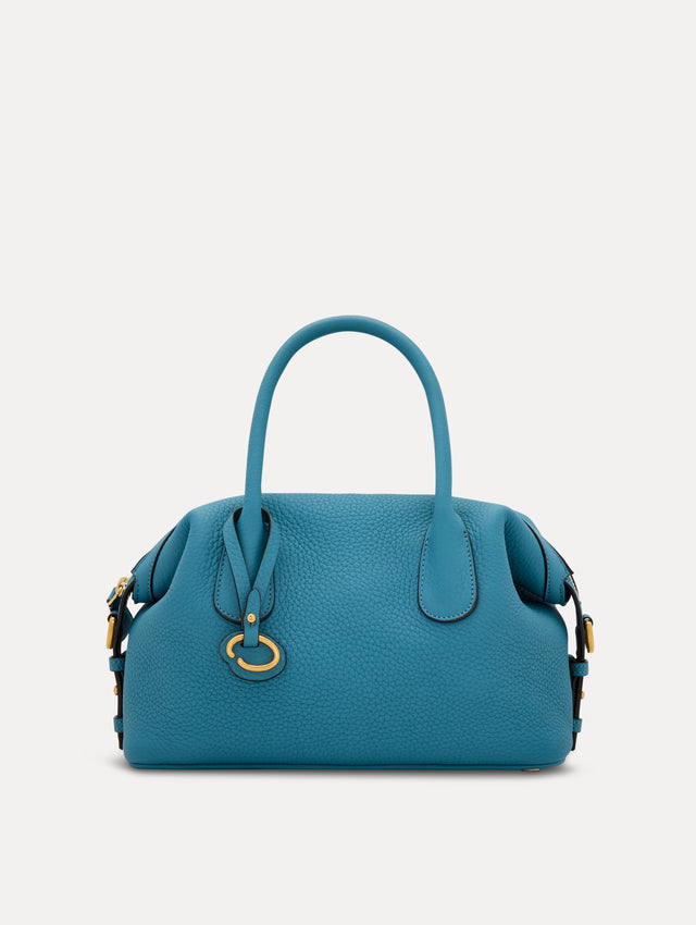 The Mini Dahlia in Blue. This mini duffle bag has top handles and a removable shoulder strap. Detailed with Oscar de la Renta signature O emblem on the hangtag. Front View